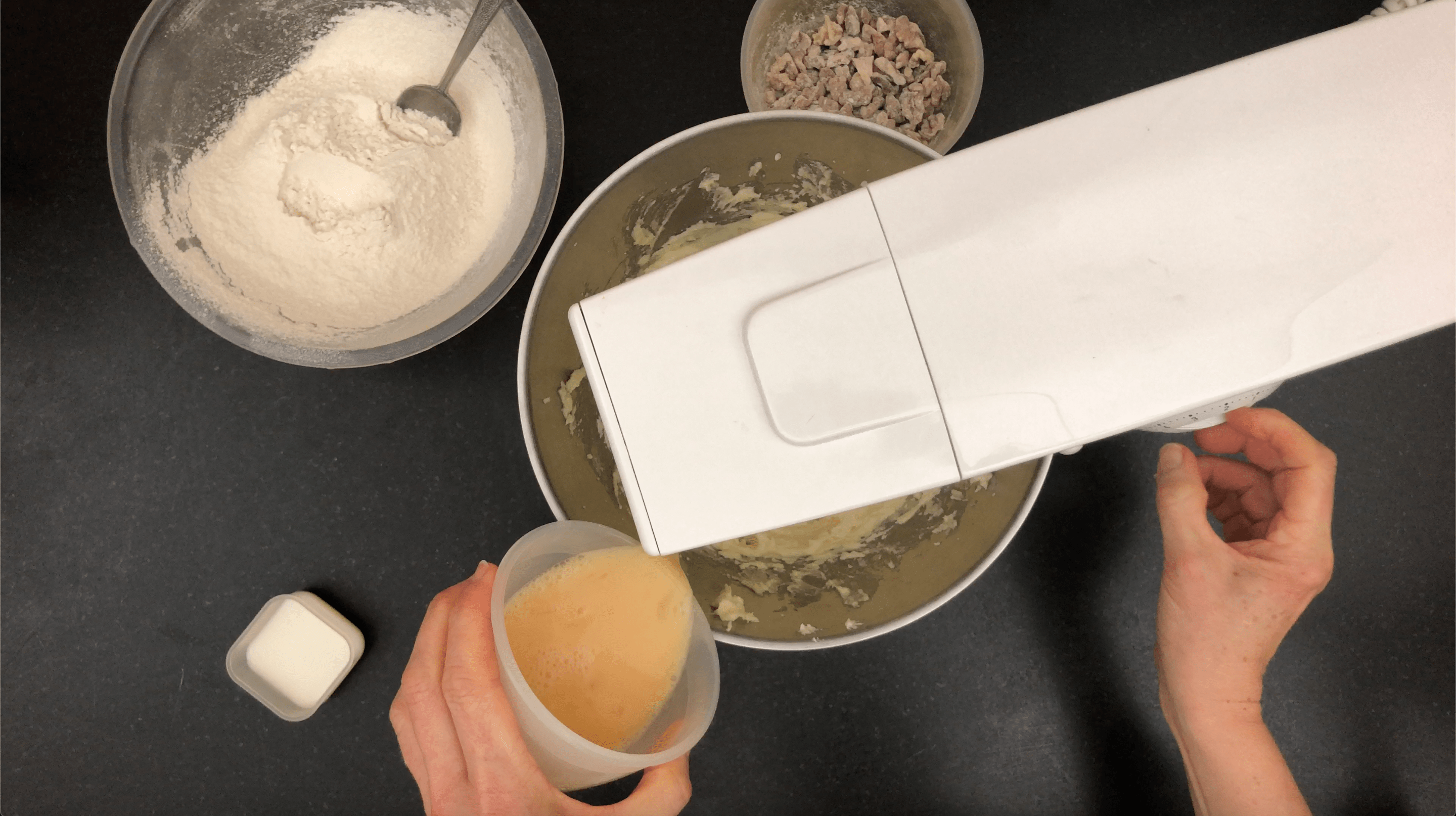 Adding egg to cake mixture in a stand mixer