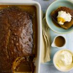 Sponge pudding with cream & sauce on the side