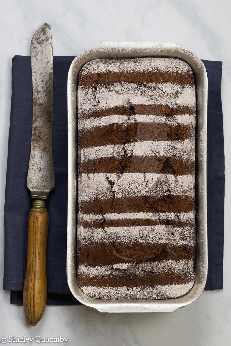 Chocolate loaf cake in a tin